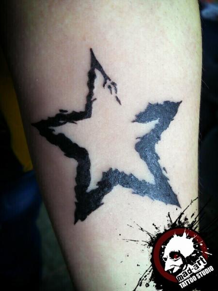 Black Star Blackwork tattoo by Mad-art Tattoo