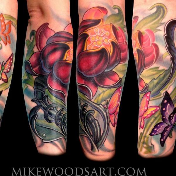 Arm Butterfly Flower tattoo by Mike Woods