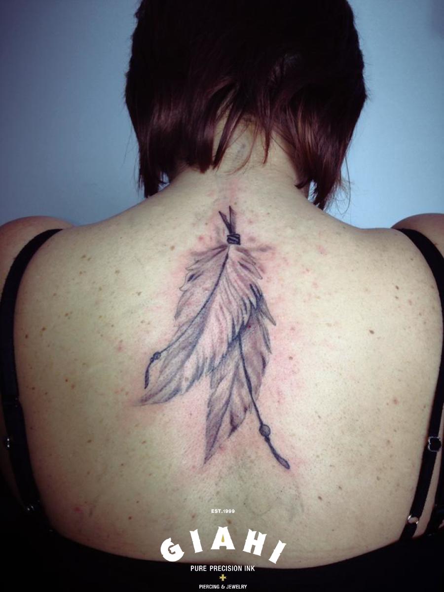 Back Feather tattoo by Goran Petrovic