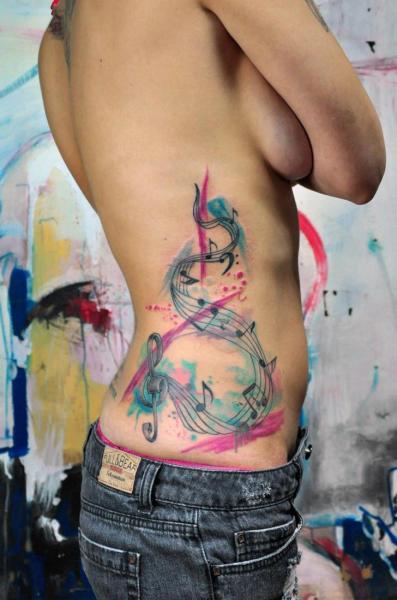 Bass and Treble Clef Aquarelle tattoo by Galata Tattoo