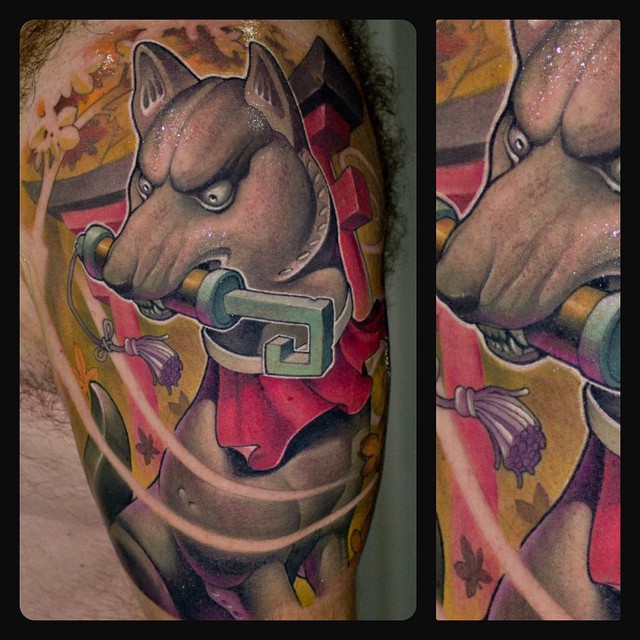 Hook in Teeth Dog tattoo