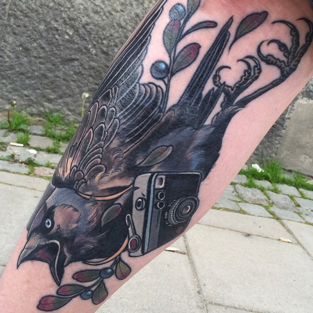 Photographer Crow tattoo