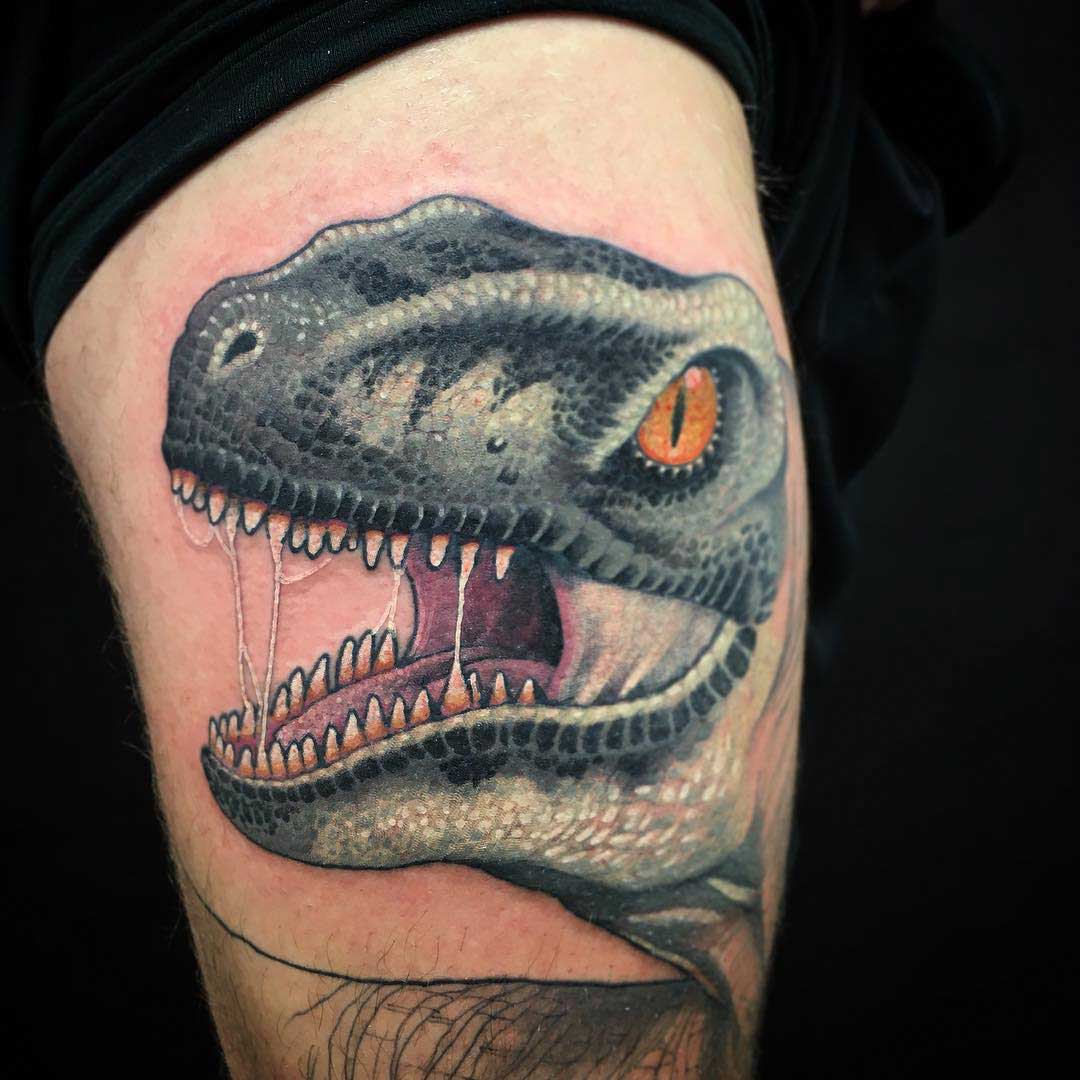 dinosaur raptor tattoo