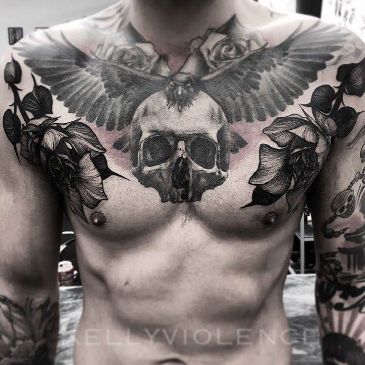 roses and skull tattoo on chest