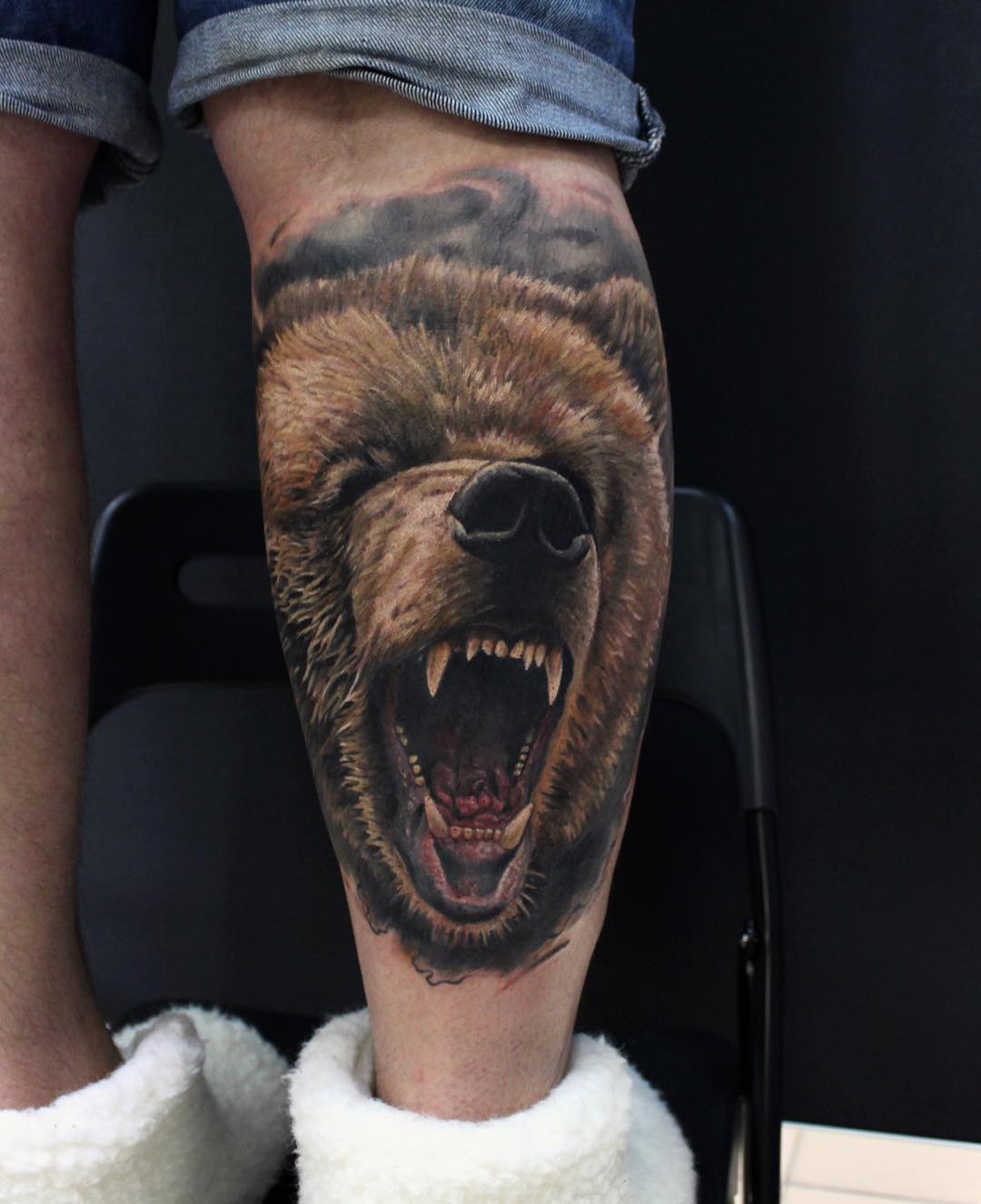 realistic tattoo of a bear on leg