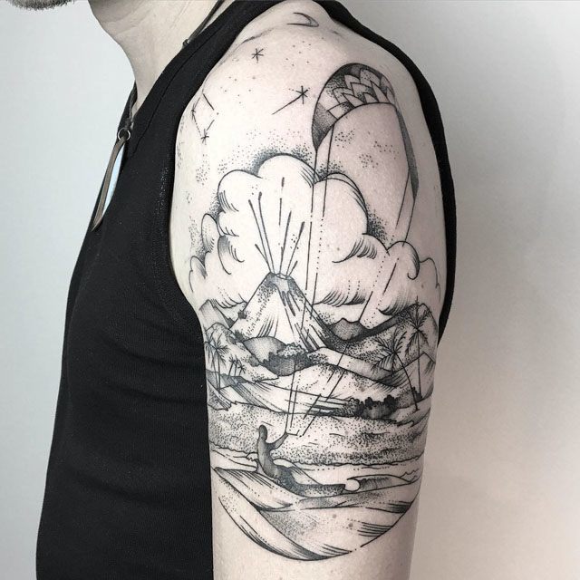 island tattoo on shoulder