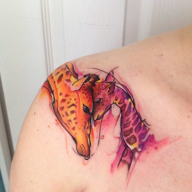 watercolor cub and giraffe tattoo