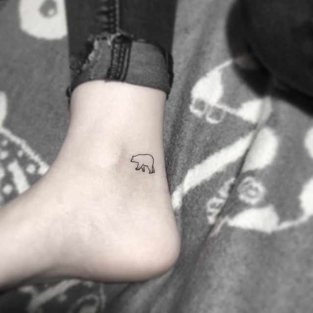 side foot bear tattoo