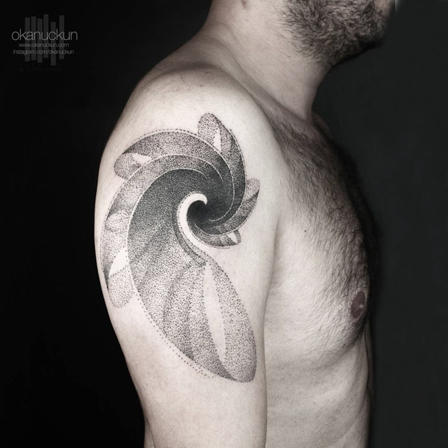 shoulder spiral tattoo