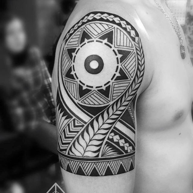 shoulder polynestian tattoo sun