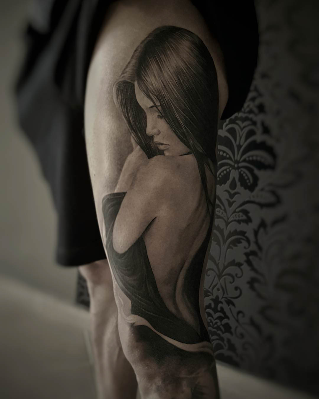 beautiful black and grey tattoo girl on arm