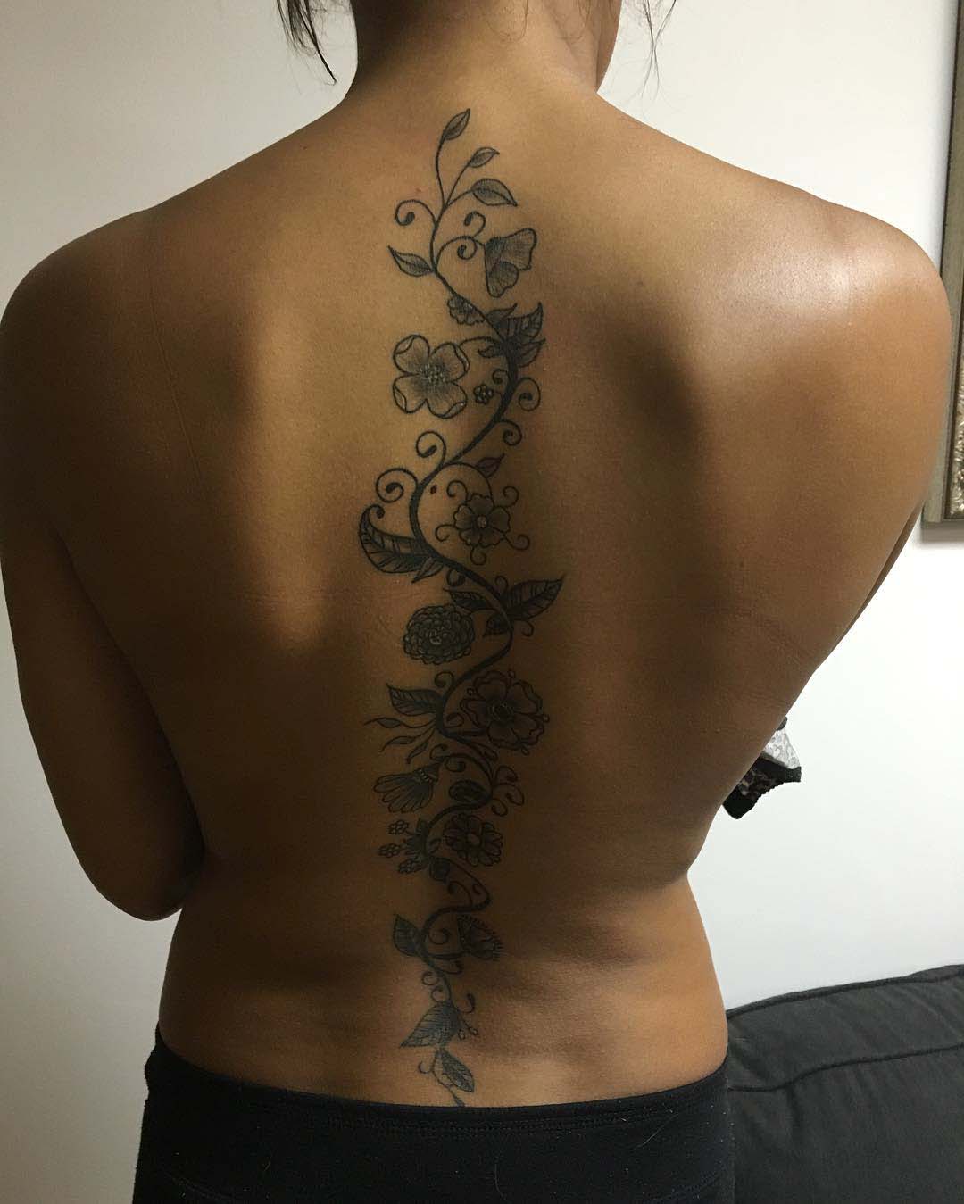 Flower Tattoo on Spine by carmelosinkcity2