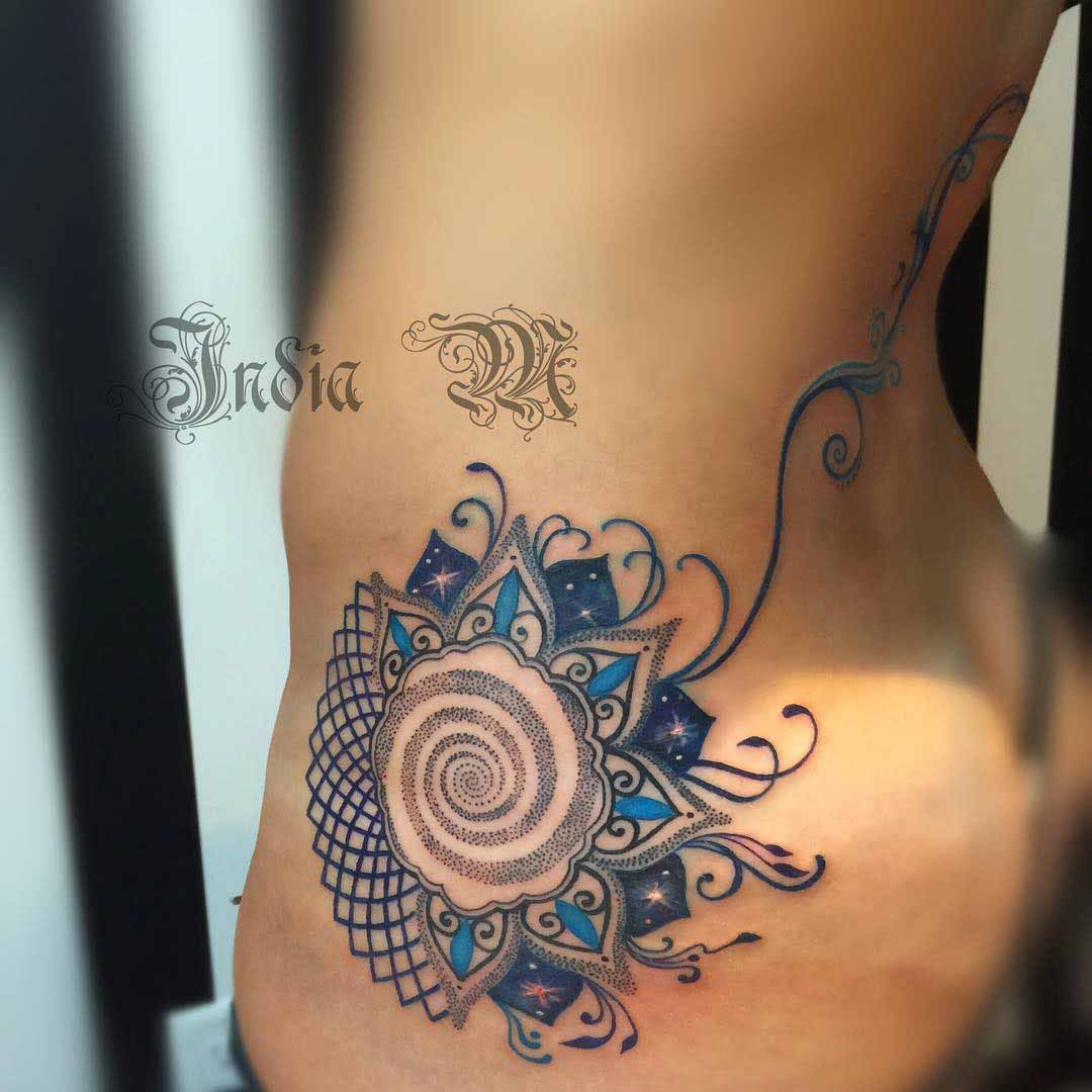 hip tattoo blue quantum mandala