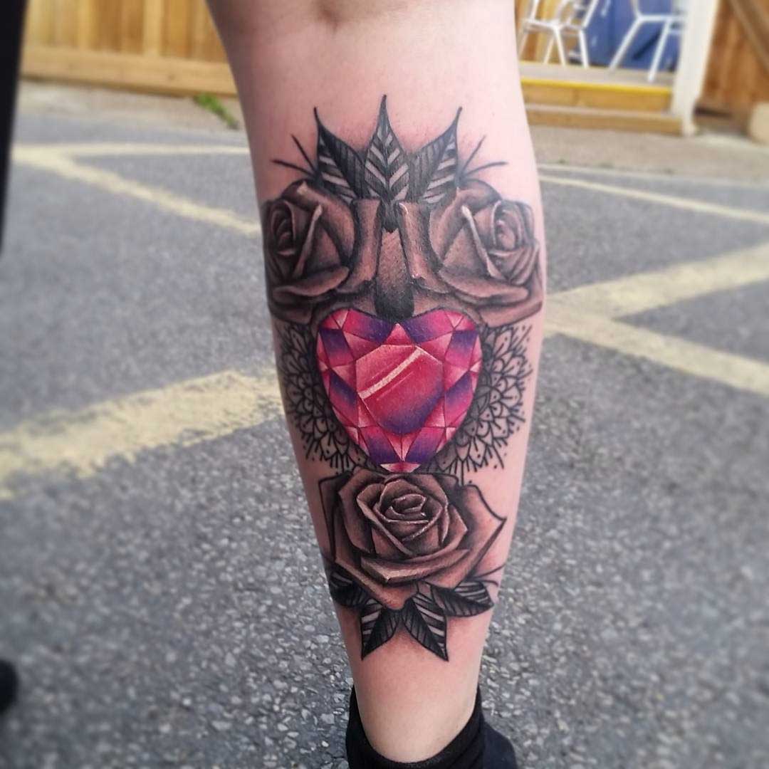 Ruby Rose Tattoo on Calf by nicholsontattoos