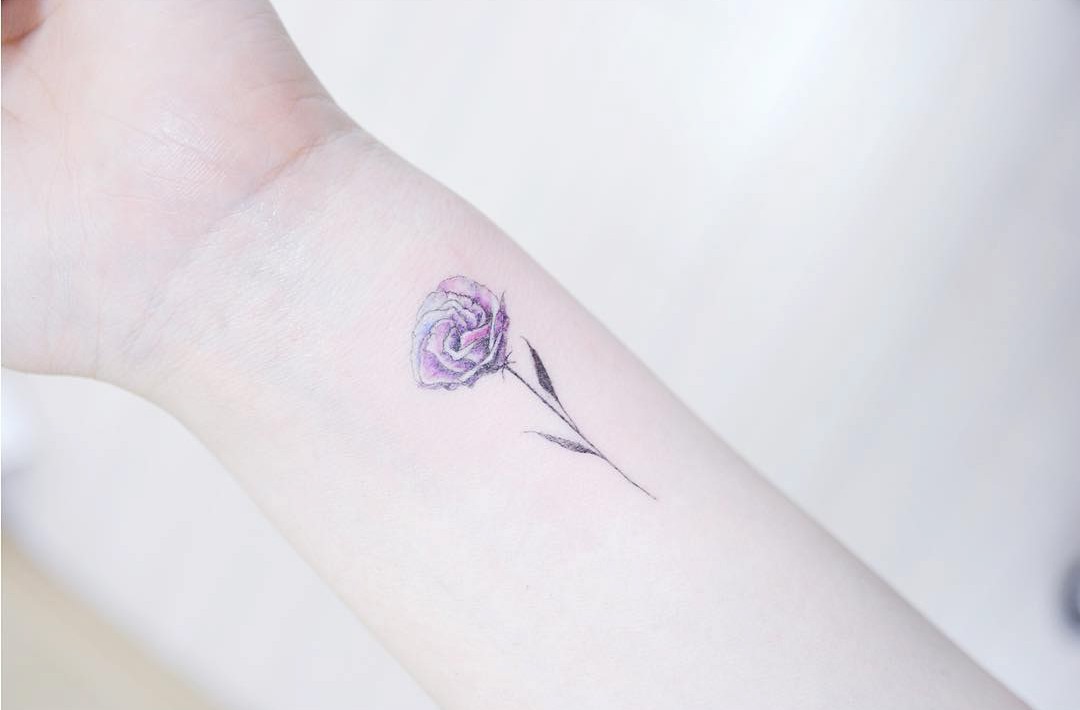 purple rose small tattoo on wrist