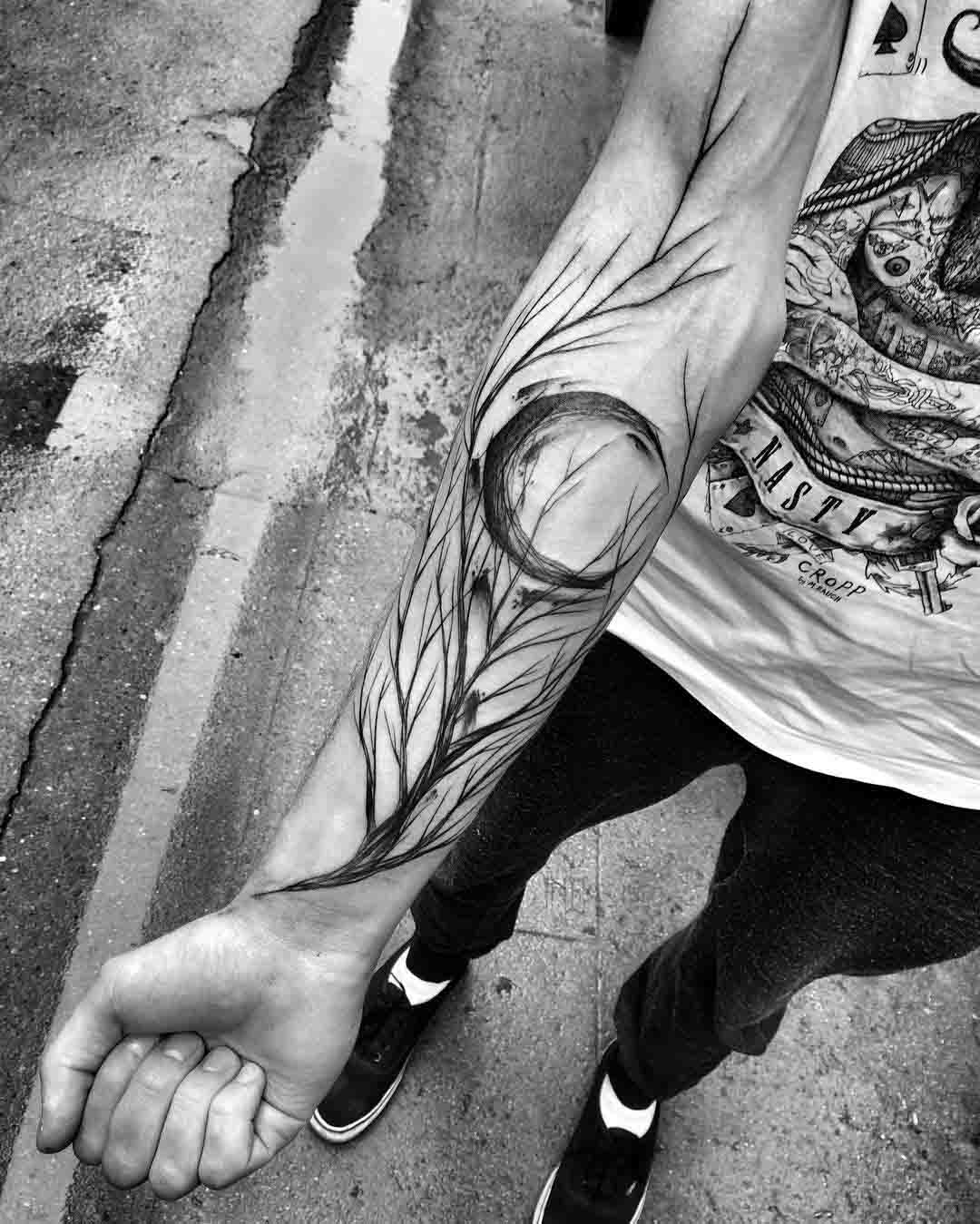 forearm tree branch tattoo