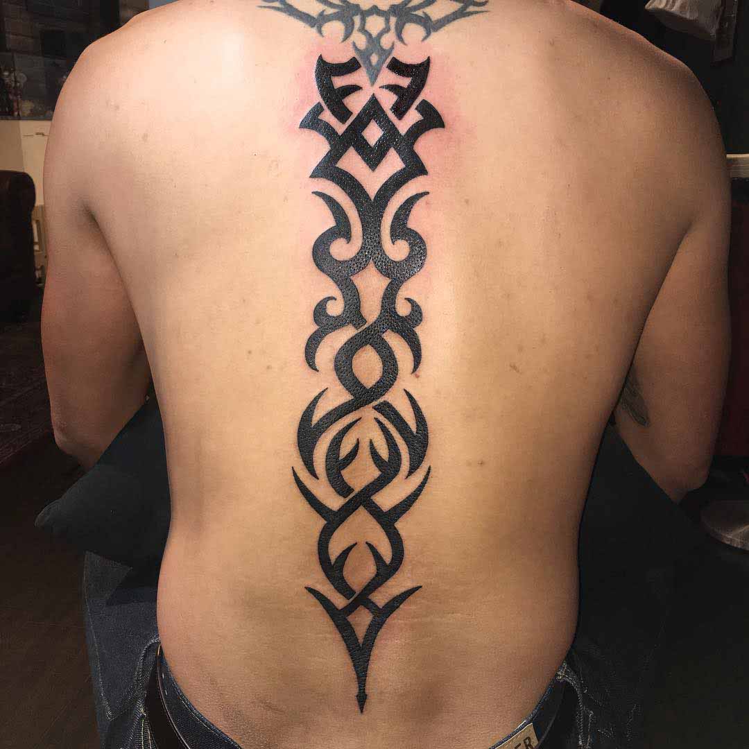 Tribal Spine Tattoo by huatcai168