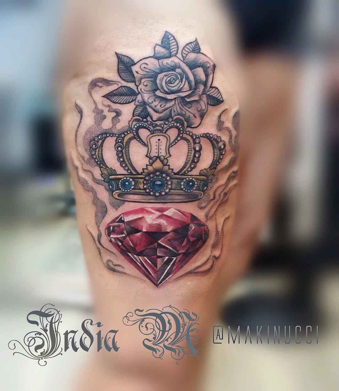 royal crown tattoo with ruby