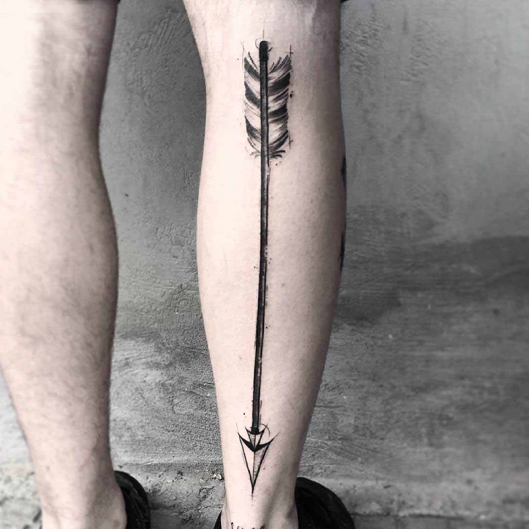 leg tattoo arrow
