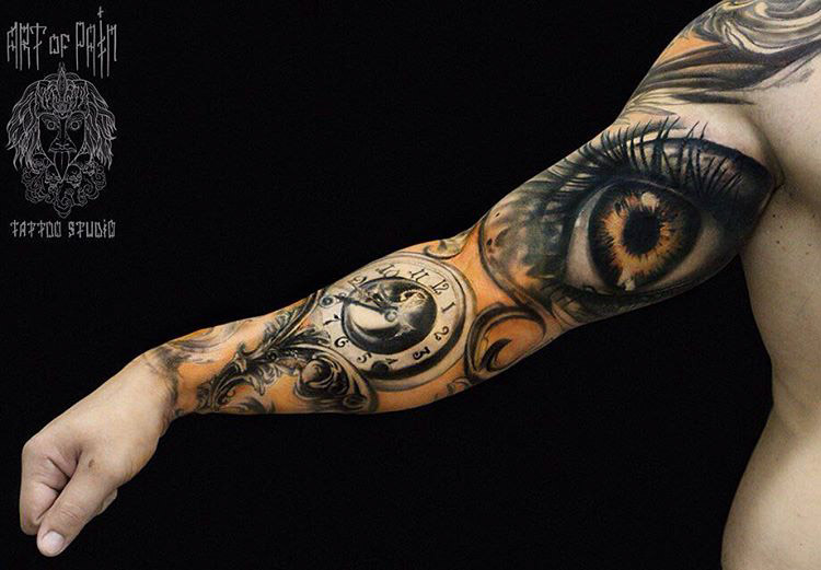 realistic tattoo sleeve clockface bicep eye