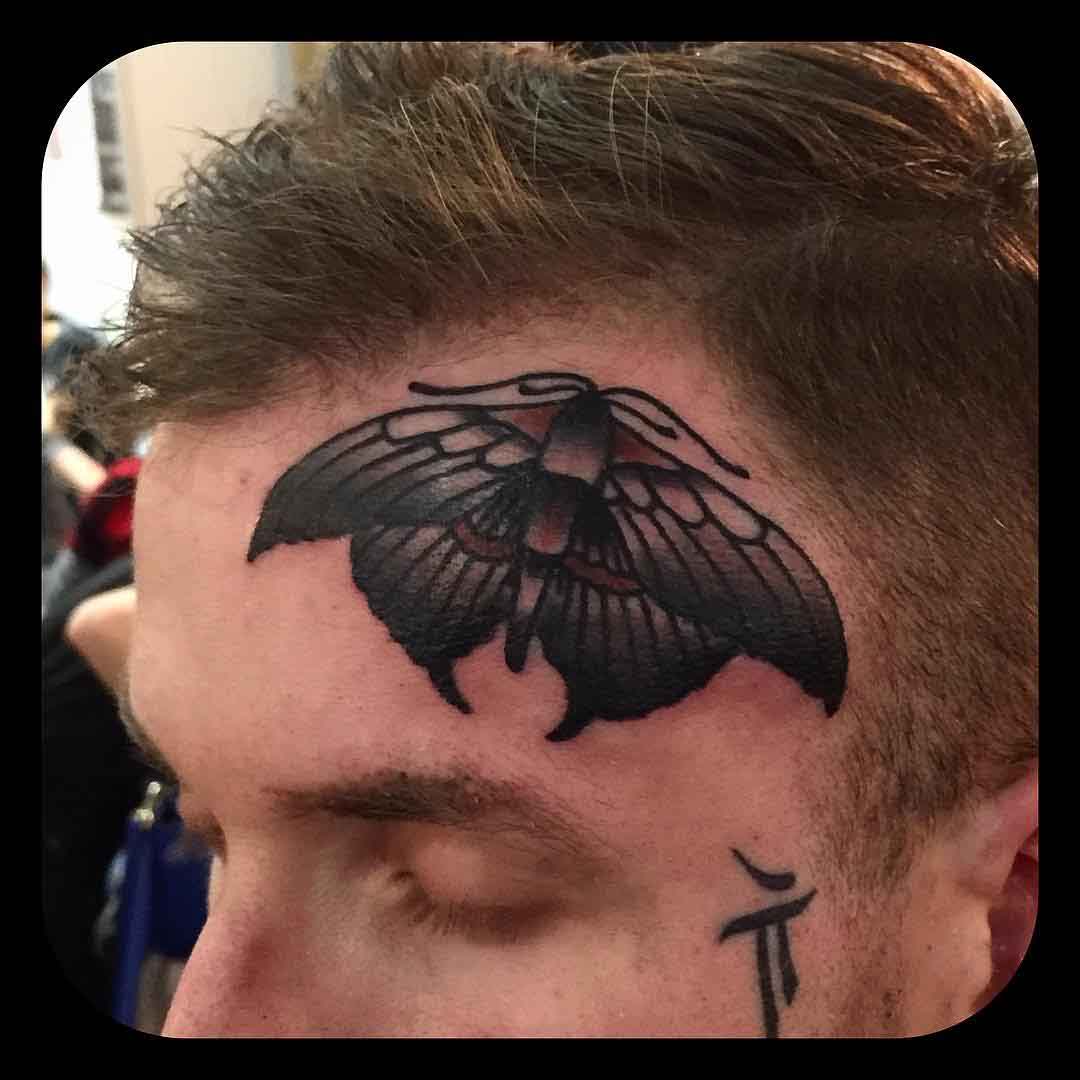 Dark Moth Tattoo on Face by pawelreduch