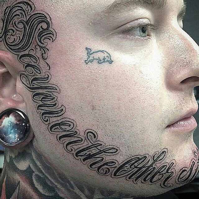 Lettering Tattoo Around The Face by porkydukecityink