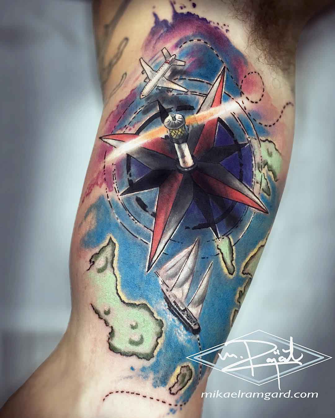 nautical tattoo on bicep travelling themed