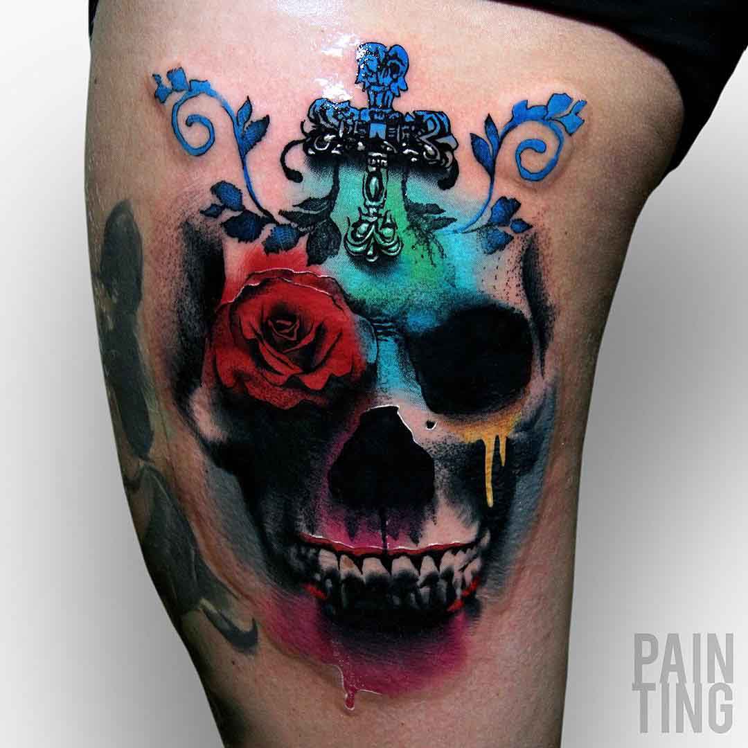 colorful skull tattoo on hip
