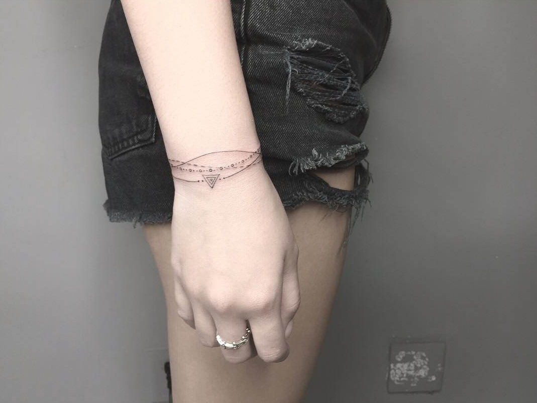 bracelet tattoo on wrist
