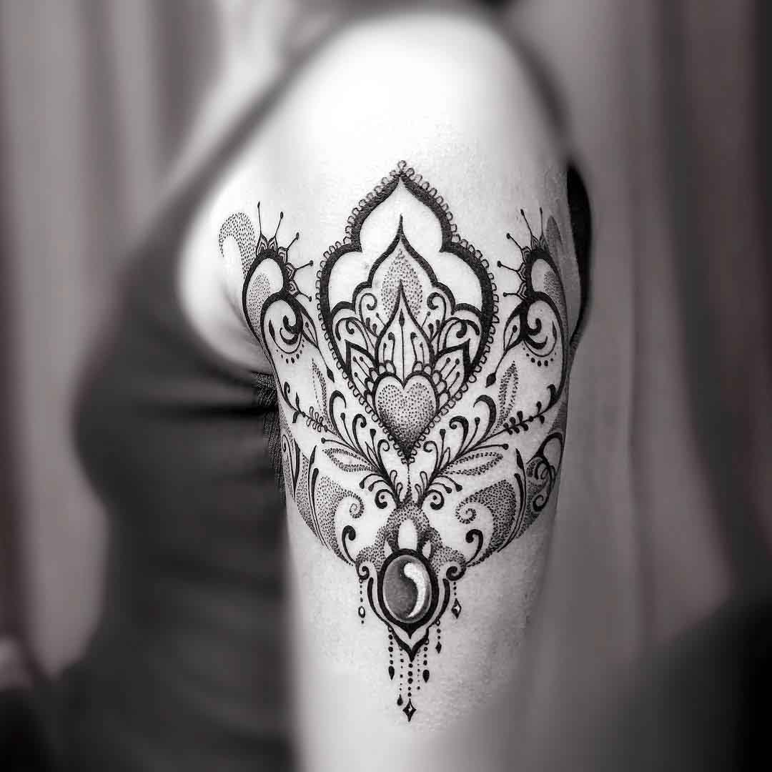 dotwork ornamental tattoo on shoulder for girls