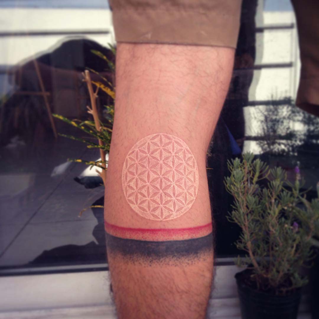 back knee white tattoo pattern