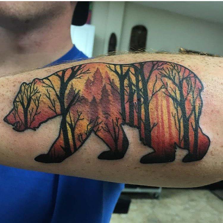 bear tattoo on arm silhouette forest inside