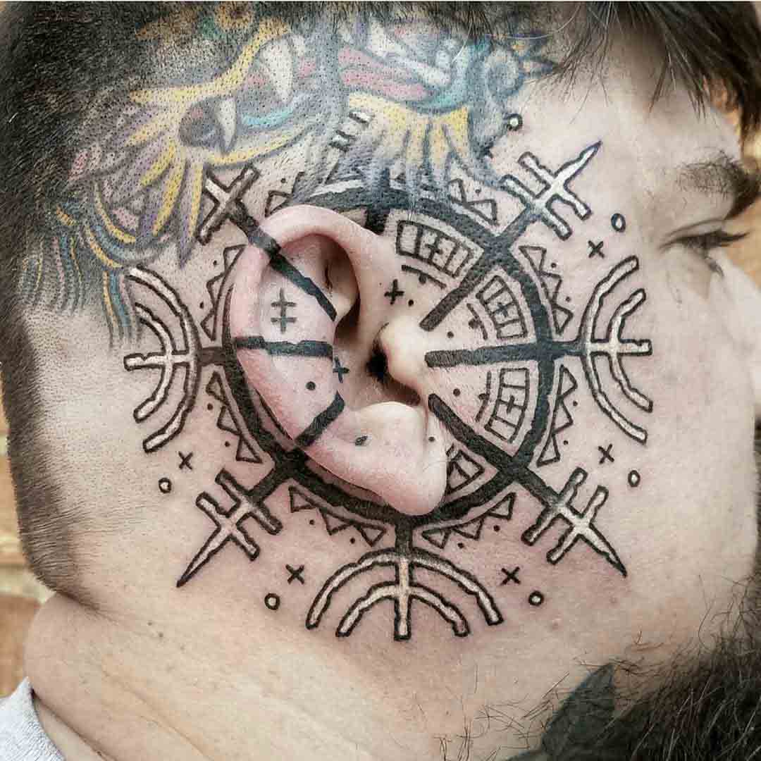 ear tattoo viking compass