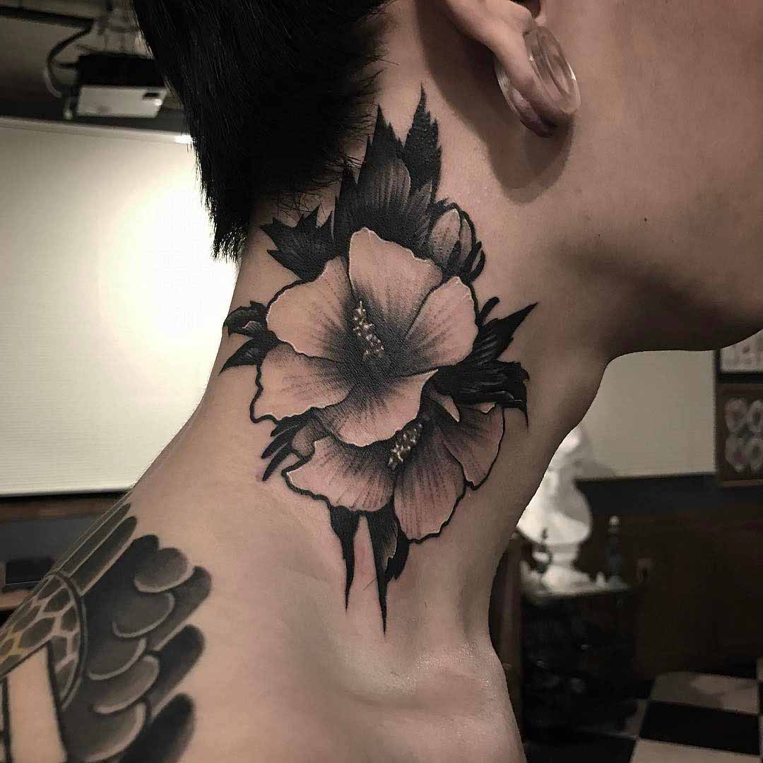 neck tattoo flower on side black and grey