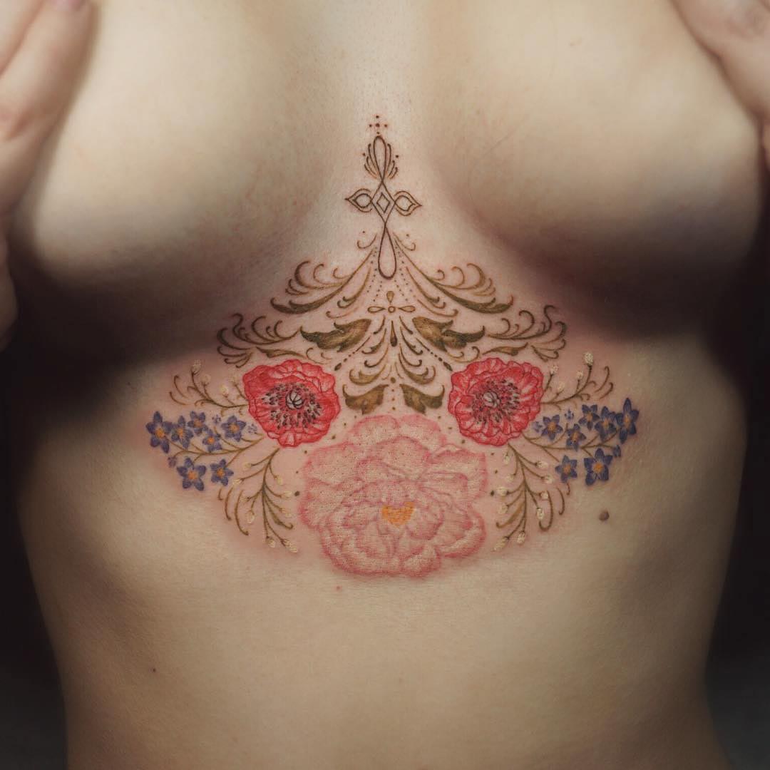 flower tatto underboobs
