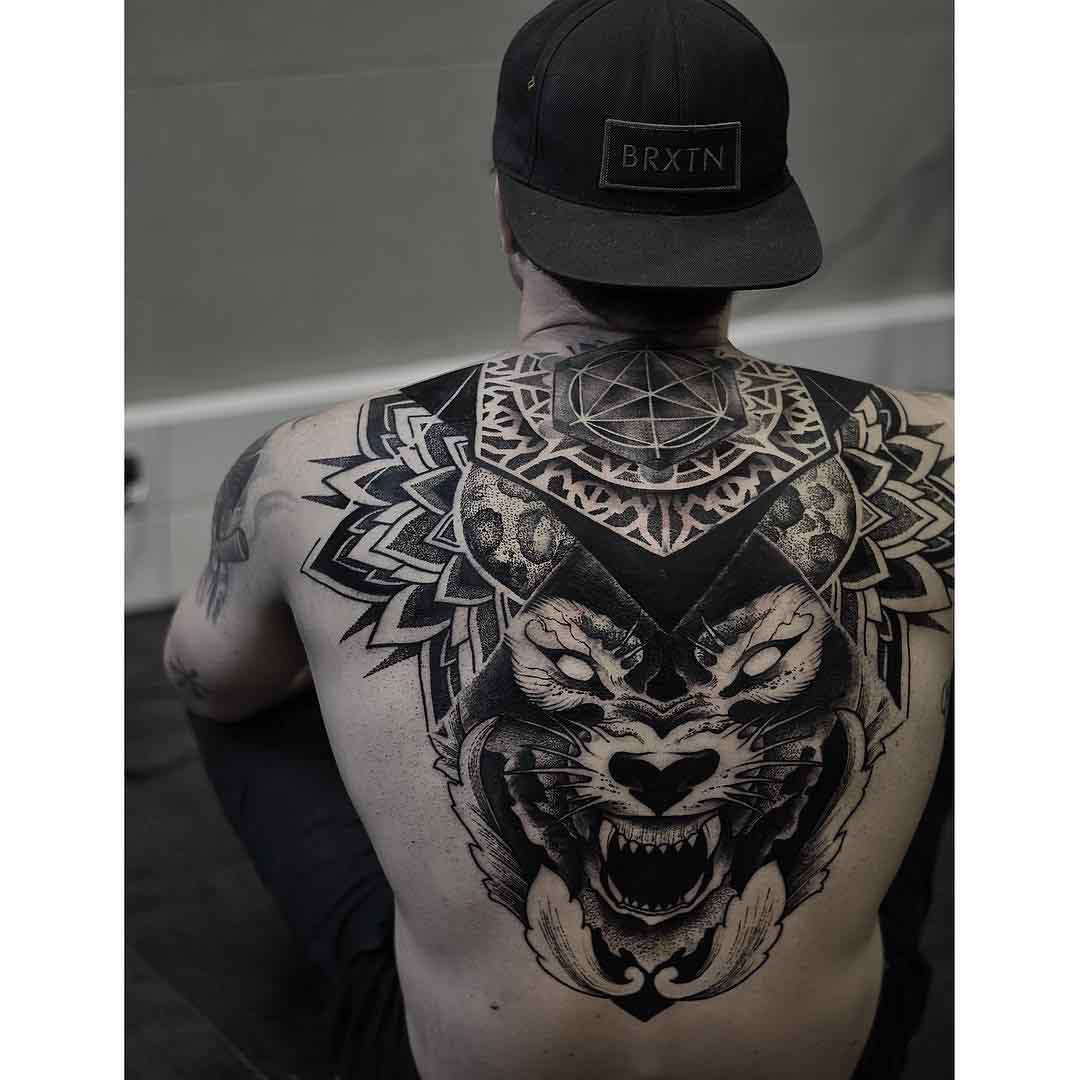 upper back tattoo wolf