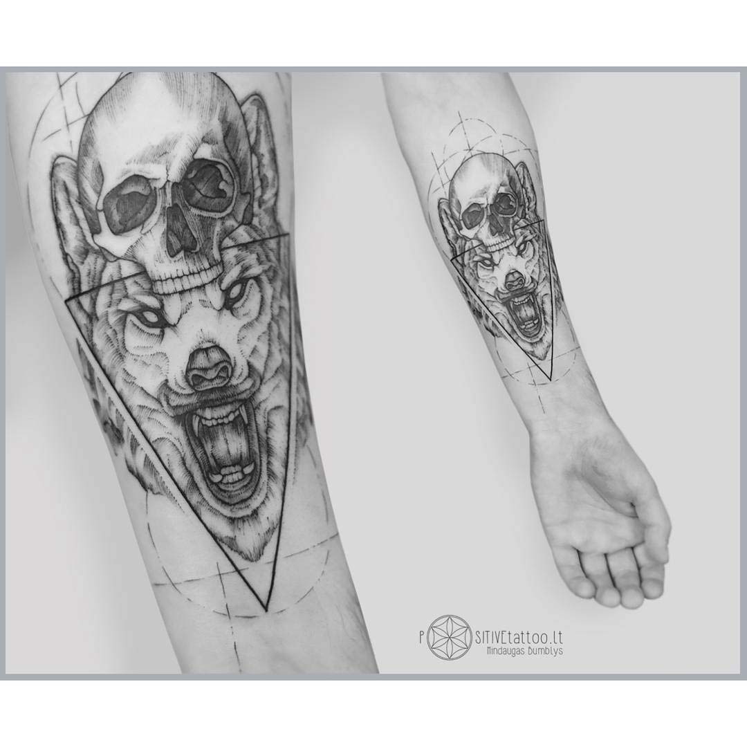 arm tattoo wolf and skull