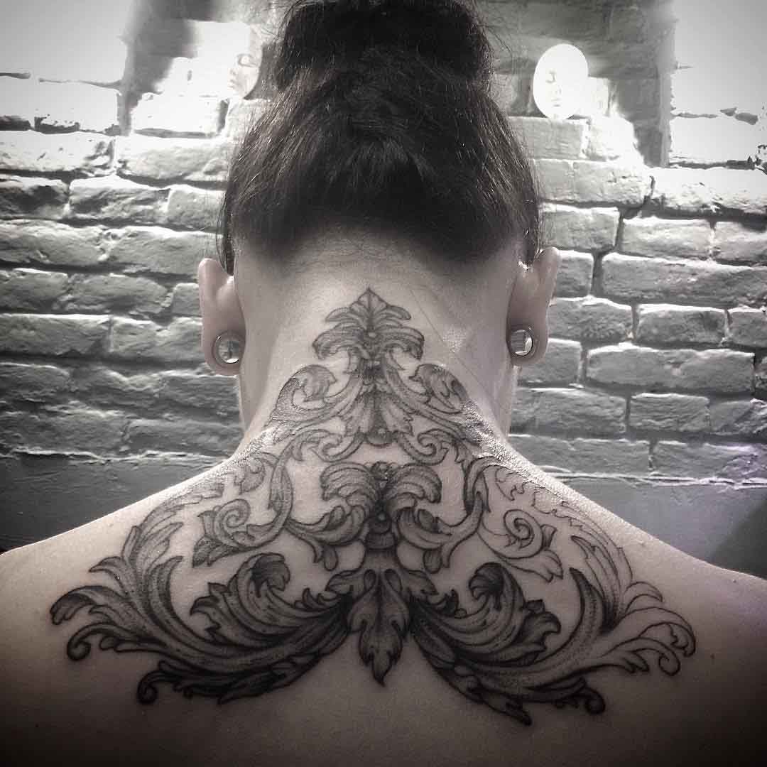 baroque tattoo on back of neck