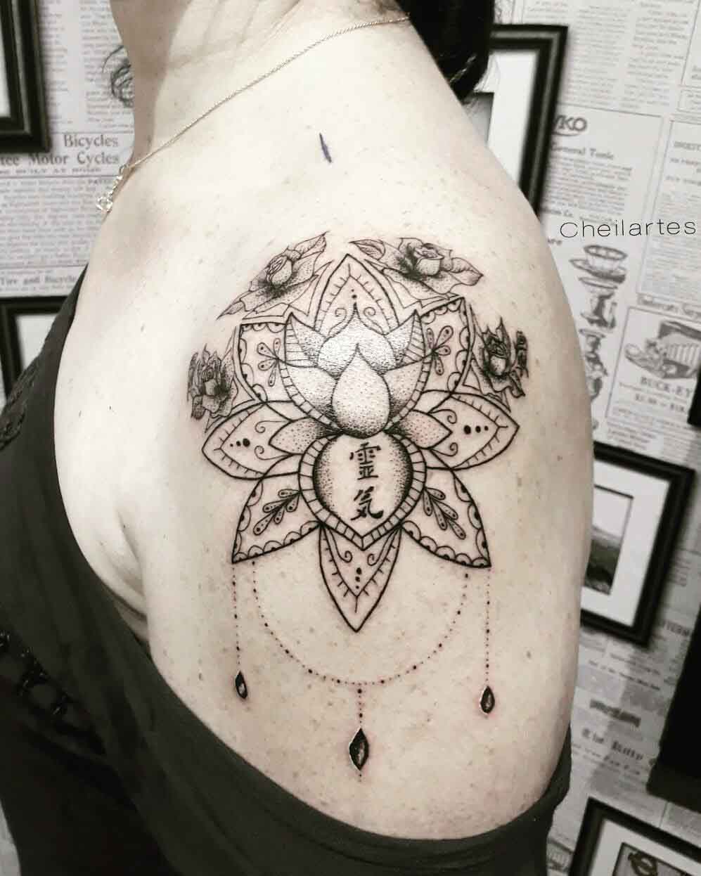 shoulder tattoo lotus flower