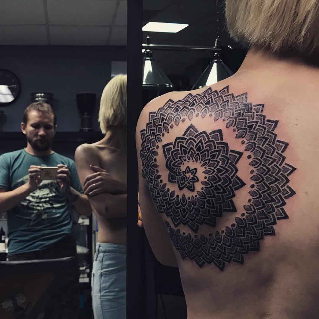 spiral mandala tattoo on shoulder blade
