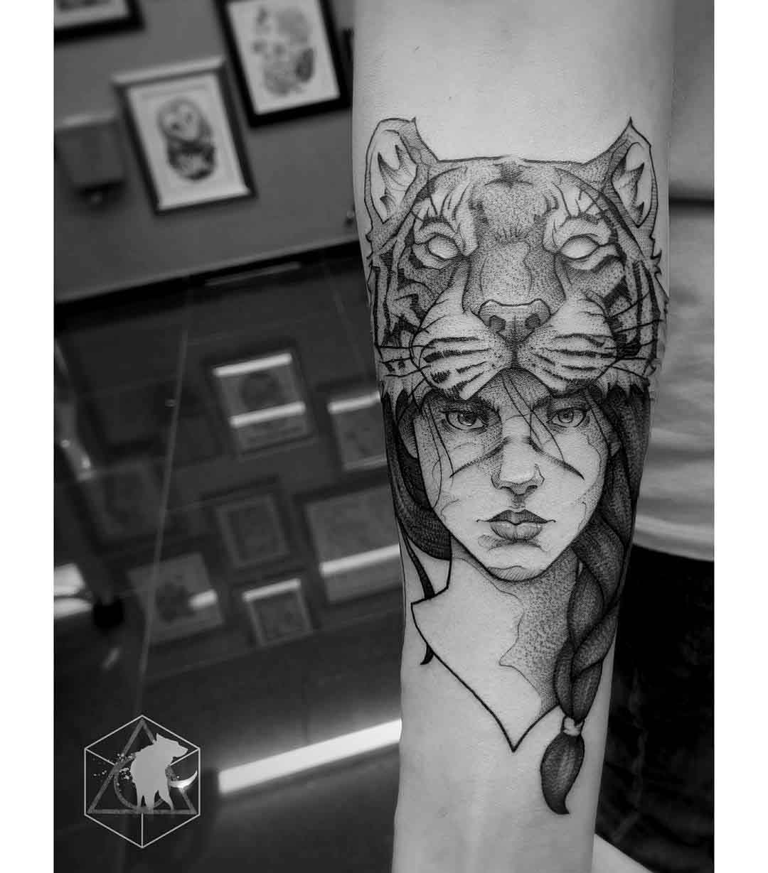 arm tattoo girl in tiger skin