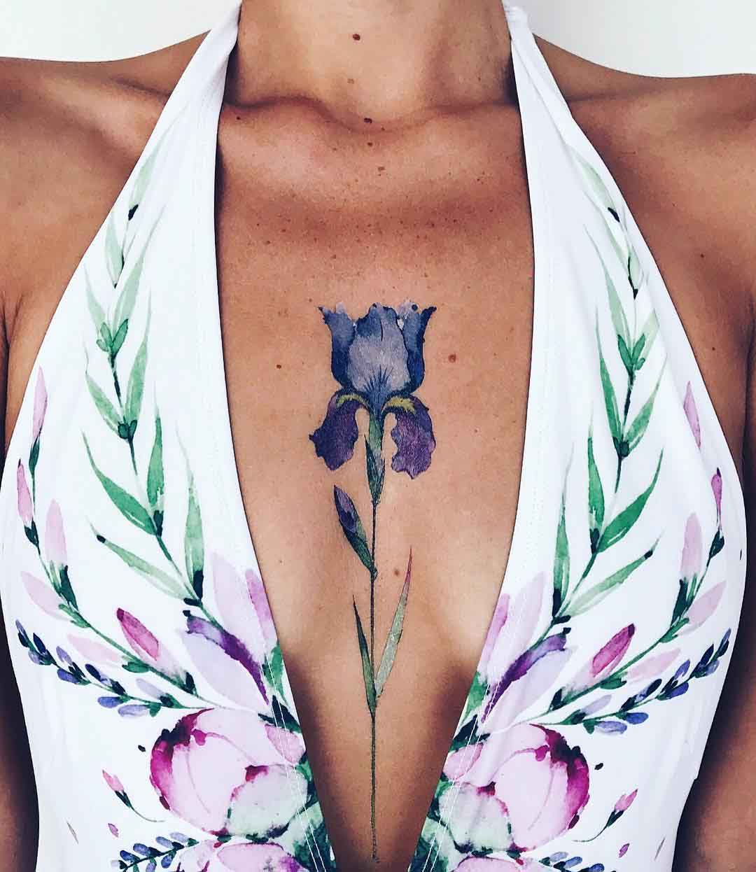 chest tattoo blue flower