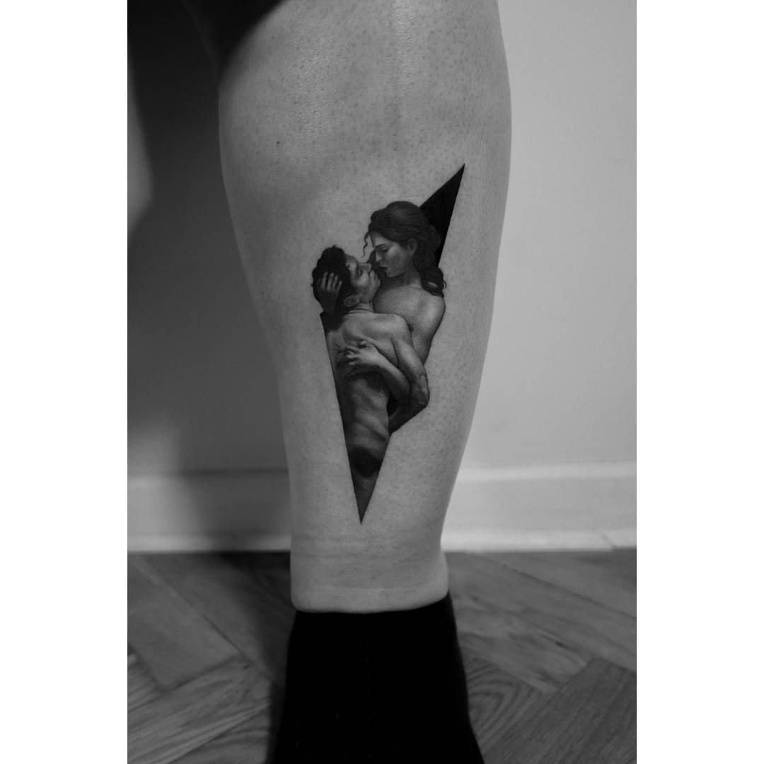 passionate hugs tattoo on calf