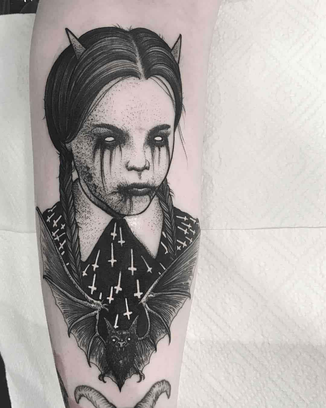 arm tattoo wenesday addams demonic