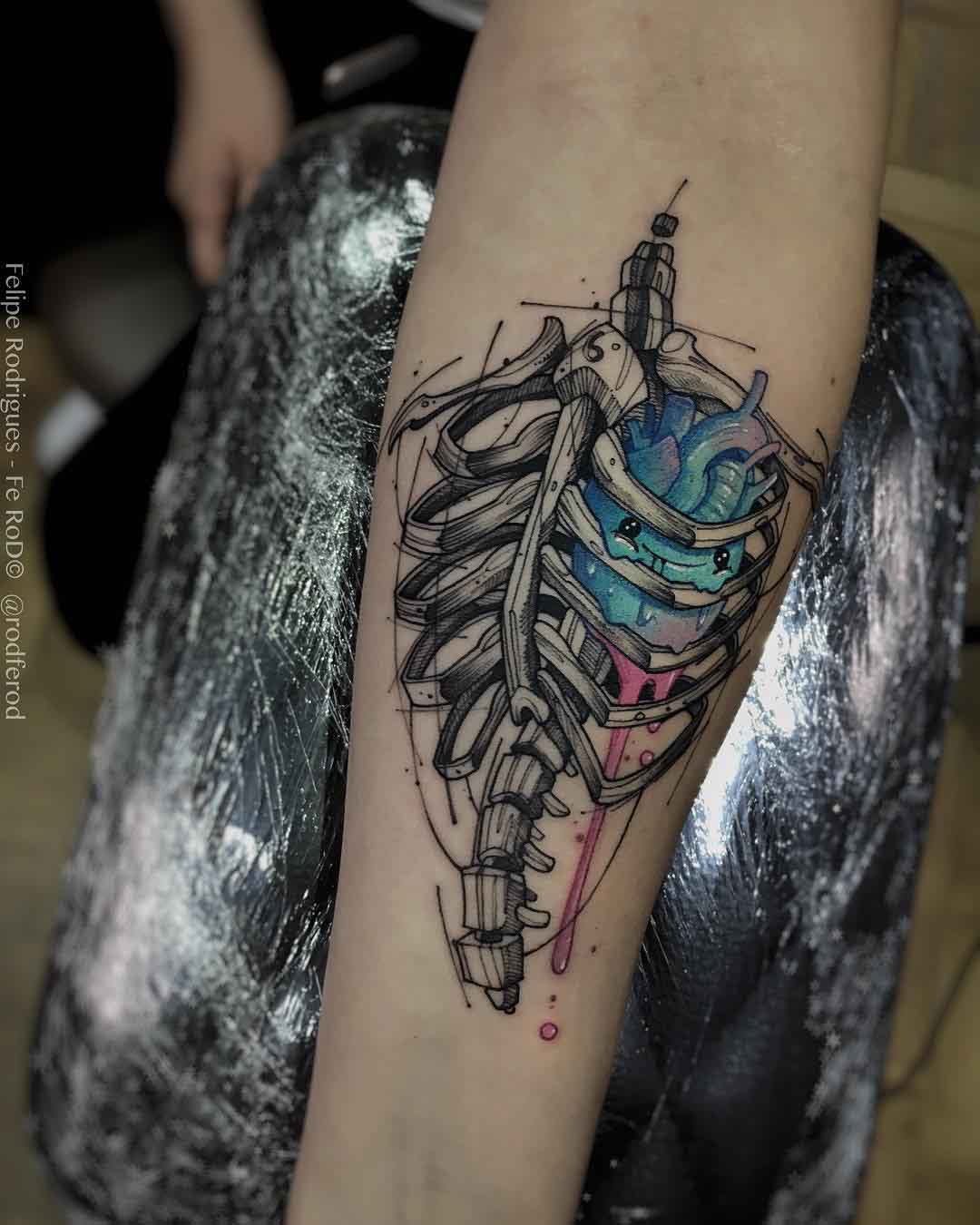 rib cage heart tattoo on arm