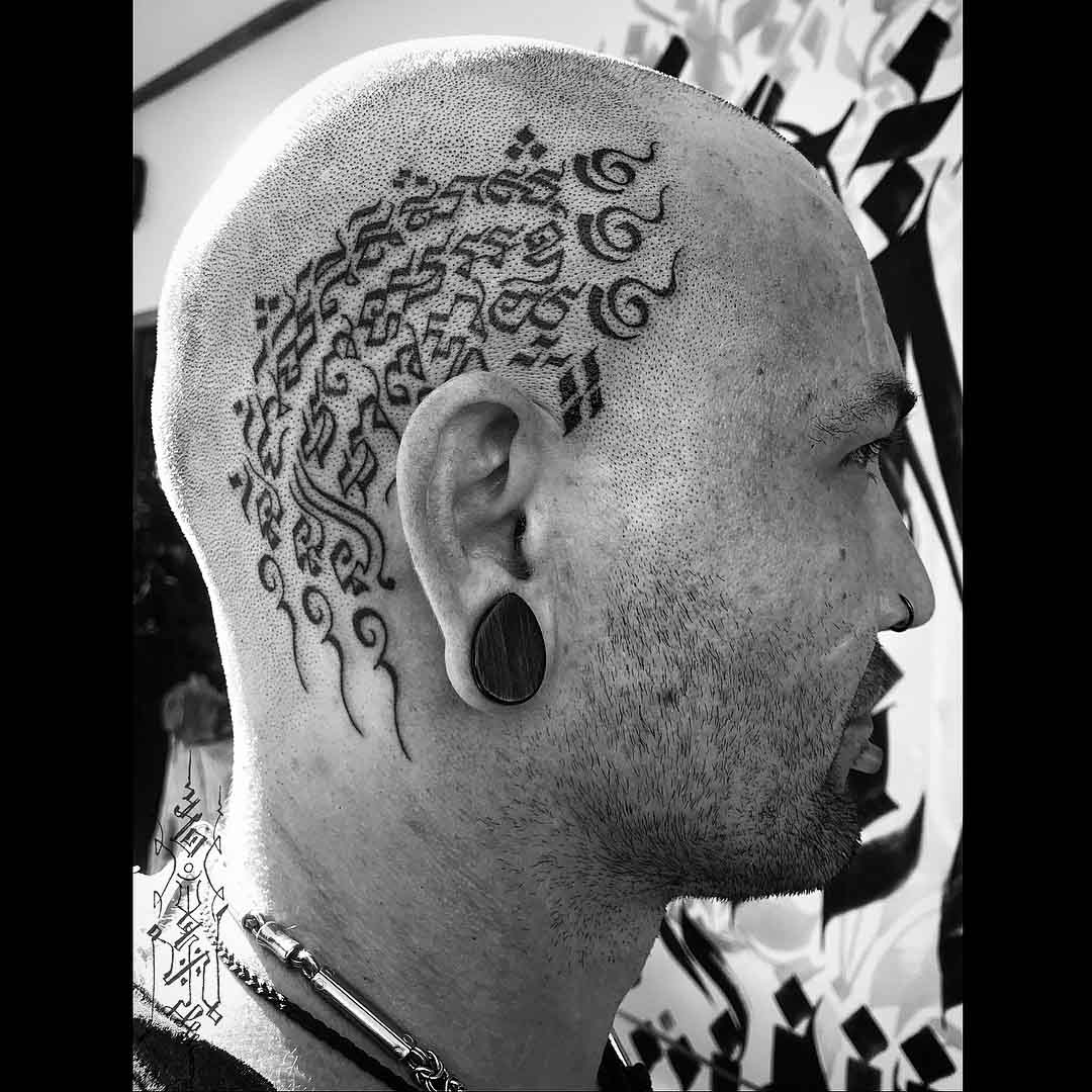 head tattoo on side