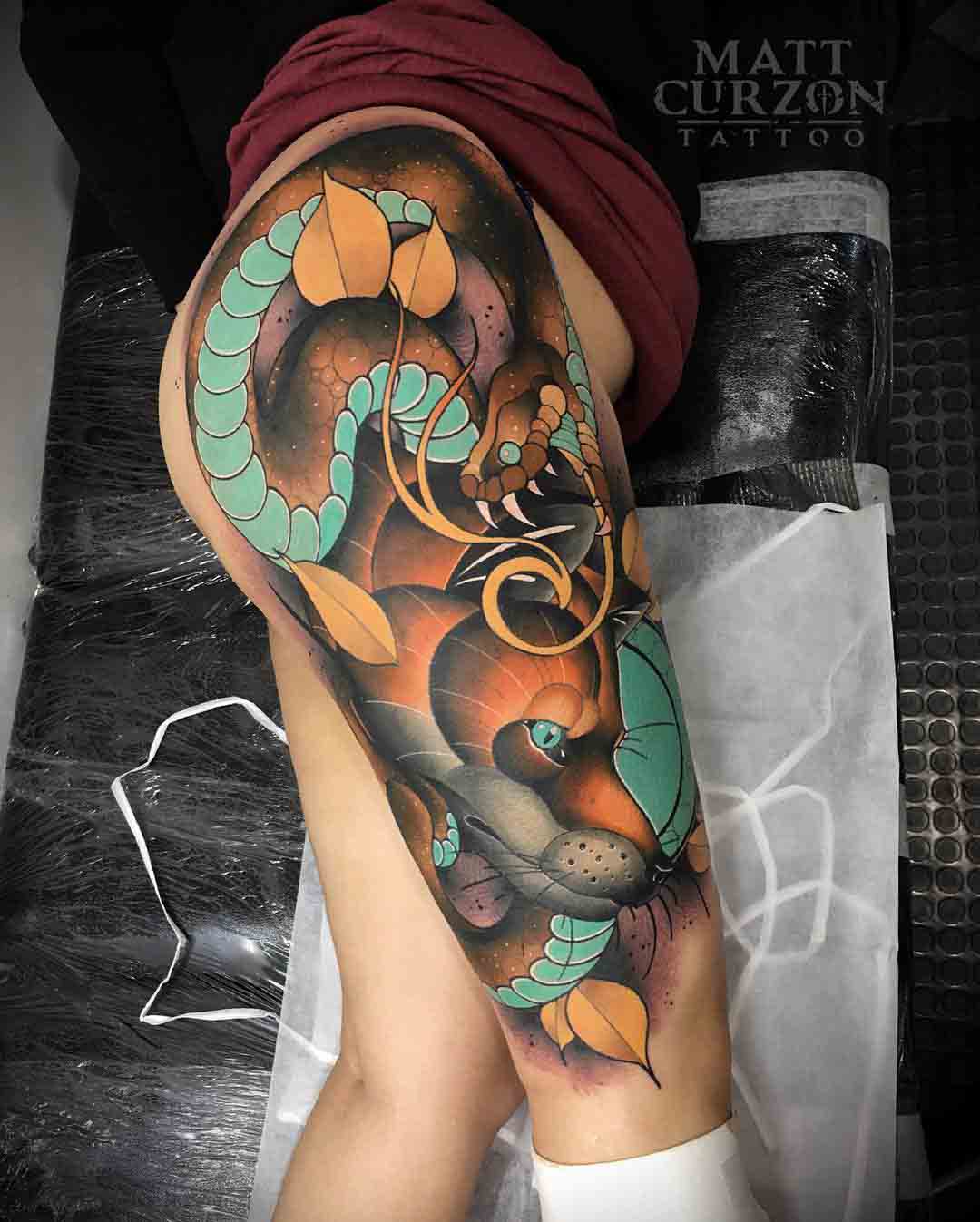 snake and fox tattoo on hip