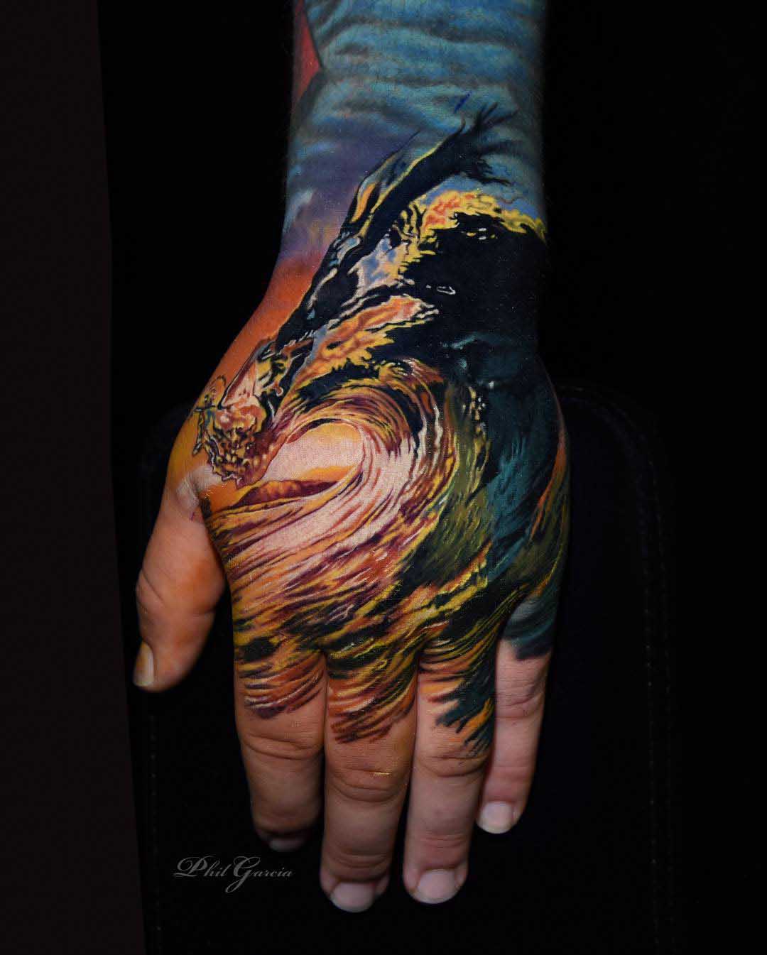 hand tattoo ocean wave
