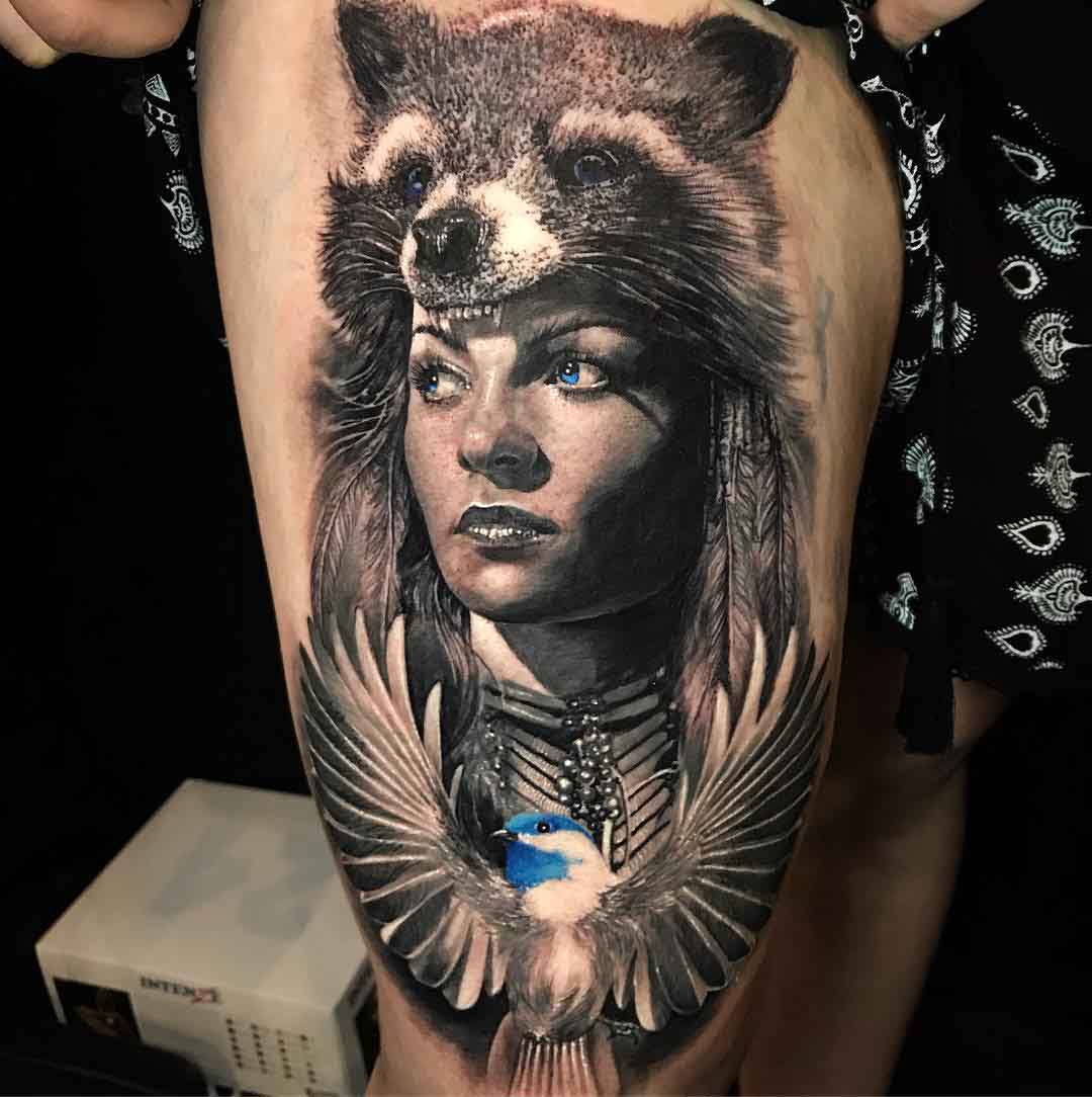 thigh tattoo portrait with coon hat