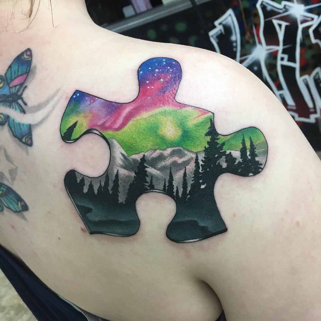 shoulder blade puzzle tattoo
